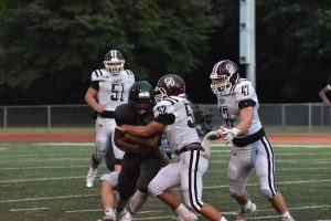 Charlie Lambert (#52), Jake Langston (#47), Chase Hughes (#51)